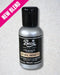 Bottle of Beau Natural Amaretto flavor concentrate on a textured gray background with pink banner.