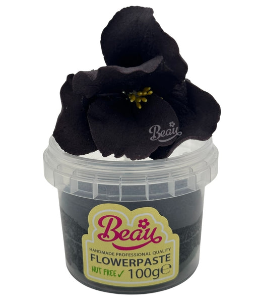 Handcrafted black sugar flower made with Beau flowerpaste. Perfect for cakes, events, or displays—realistic, vibrant, and easy to work with.