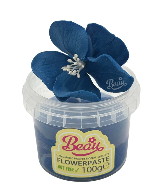 Handmade cornflower blue flower created with Beau flowerpaste