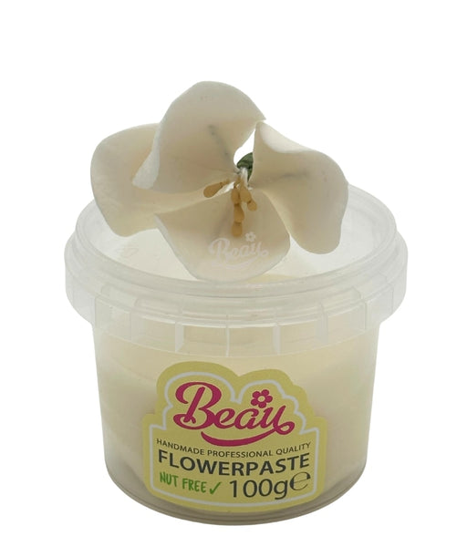 Handmade ivory flower created with Beau flowerpaste