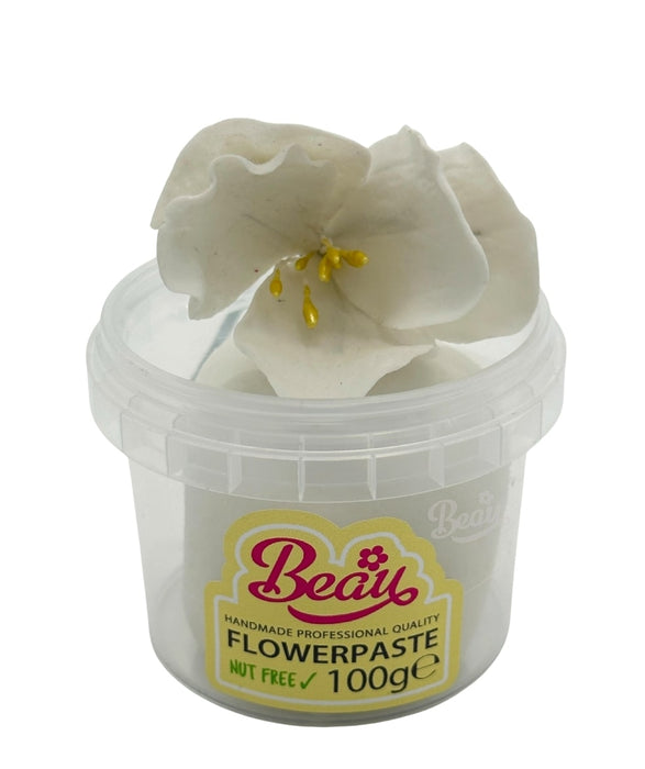 Handcrafted antique white sugar flower made with Beau flowerpaste. Perfect for cakes, events, or displays—realistic, vibrant, and easy to work with.