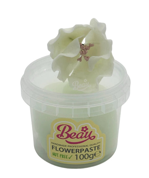 Handcrafted apple blossom sugar flower made with Beau flowerpaste. Perfect for cakes, events, or displays—realistic, vibrant, and easy to work with.