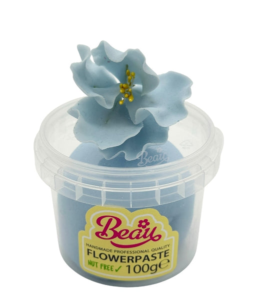 Handcrafted baby blue sugar flower made with Beau flowerpaste. Perfect for cakes, events, or displays—realistic, vibrant, and easy to work with.
