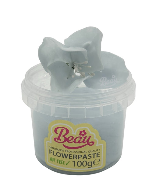 Handcrafted blue chiffon sugar flower made with Beau flowerpaste. Perfect for cakes, events, or displays—realistic, vibrant, and easy to work with.