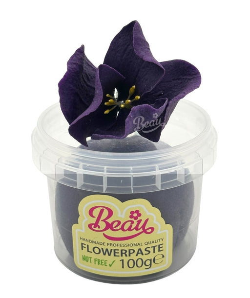Handmade deep violet flower created with Beau flowerpaste
