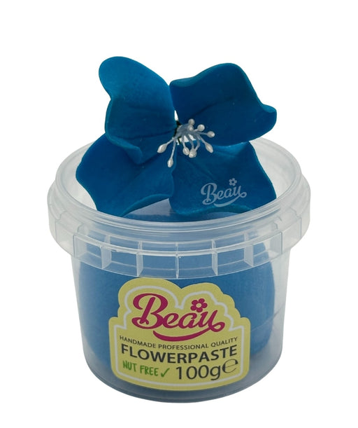 Handmade lagoon blue flower created with Beau flowerpaste
