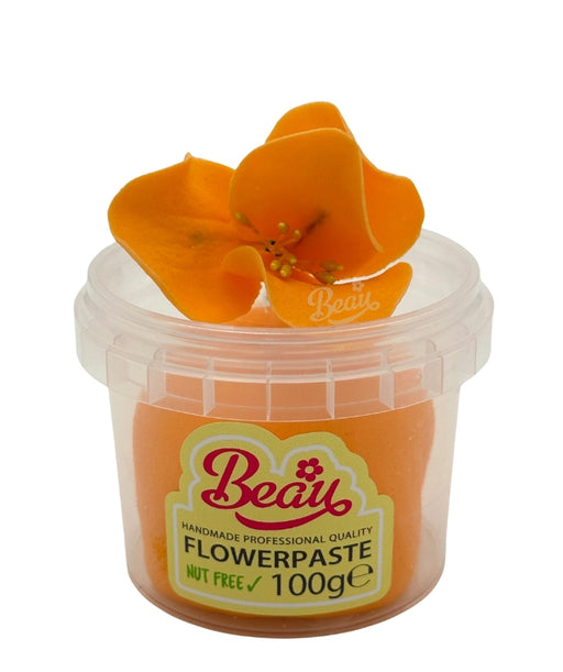Handmade orange sorbet flower created with Beau flowerpaste