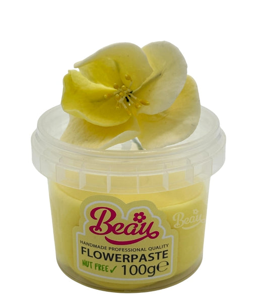 Handmade primrose yellow flower created with Beau flowerpaste
