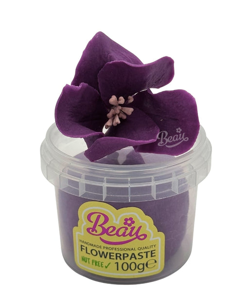 Handmade purple flower created with Beau flowerpaste