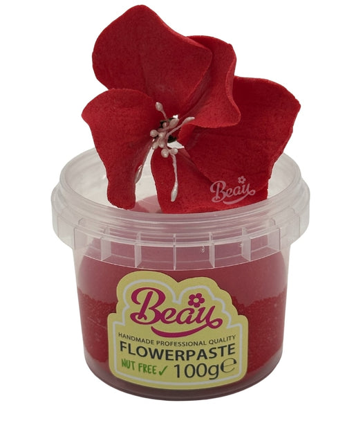 Handmade red poinsettia flower created with Beau flowerpaste