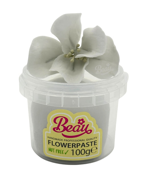 Handmade silver celebration flower created with Beau flowerpaste