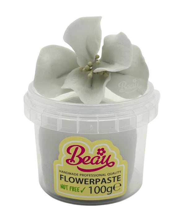 Handmade silver celebration flower created with Beau flowerpaste