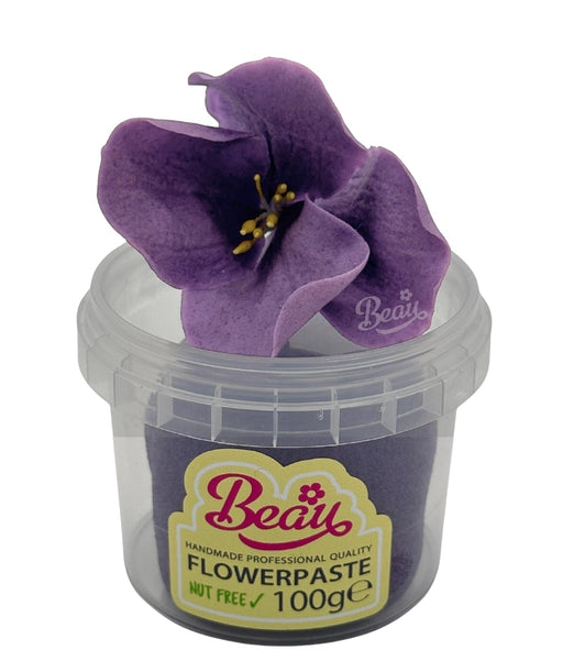 Handmade African viola flower created with Beau flowerpaste